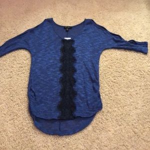 Super cute blue and black lace shirt.